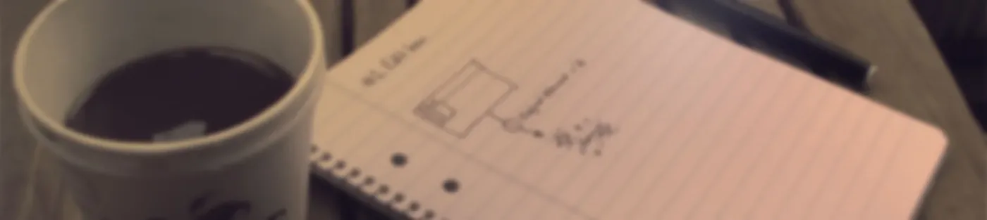 Planning notes and coffee on a desk